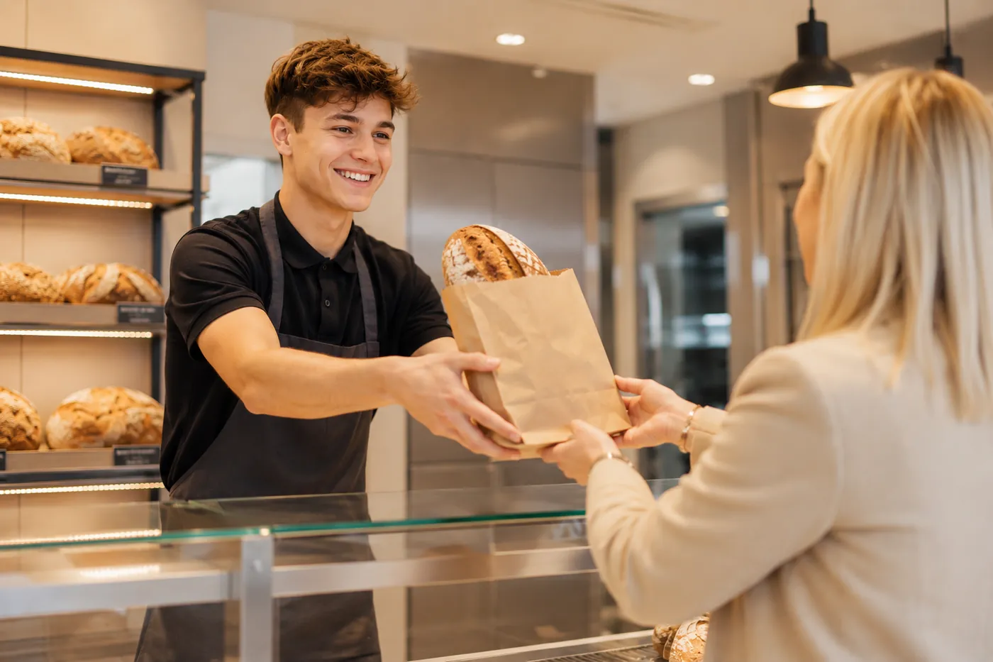 Bread handed over the bakery counter